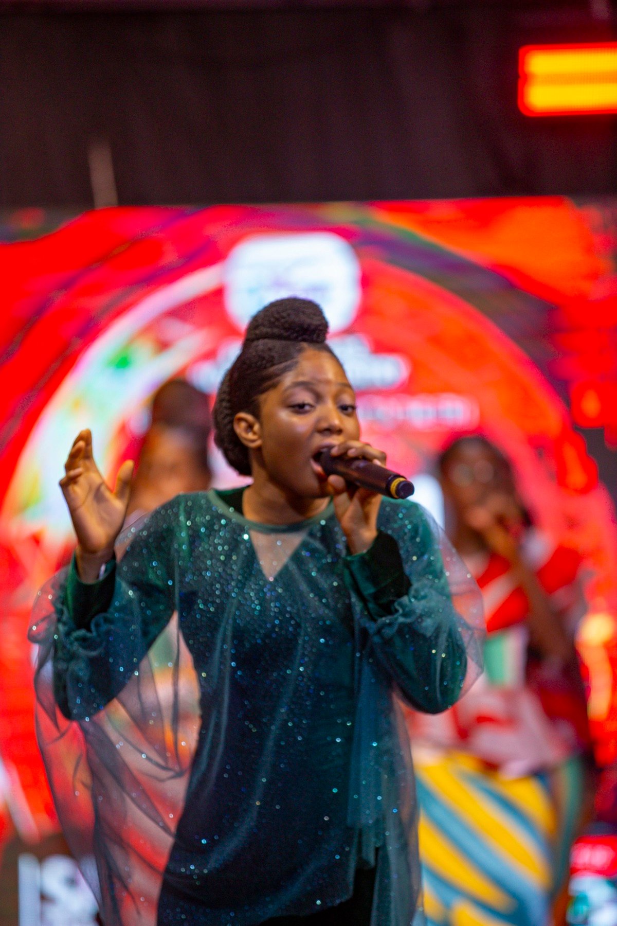 Emily Adade Boateng singing live on stage
